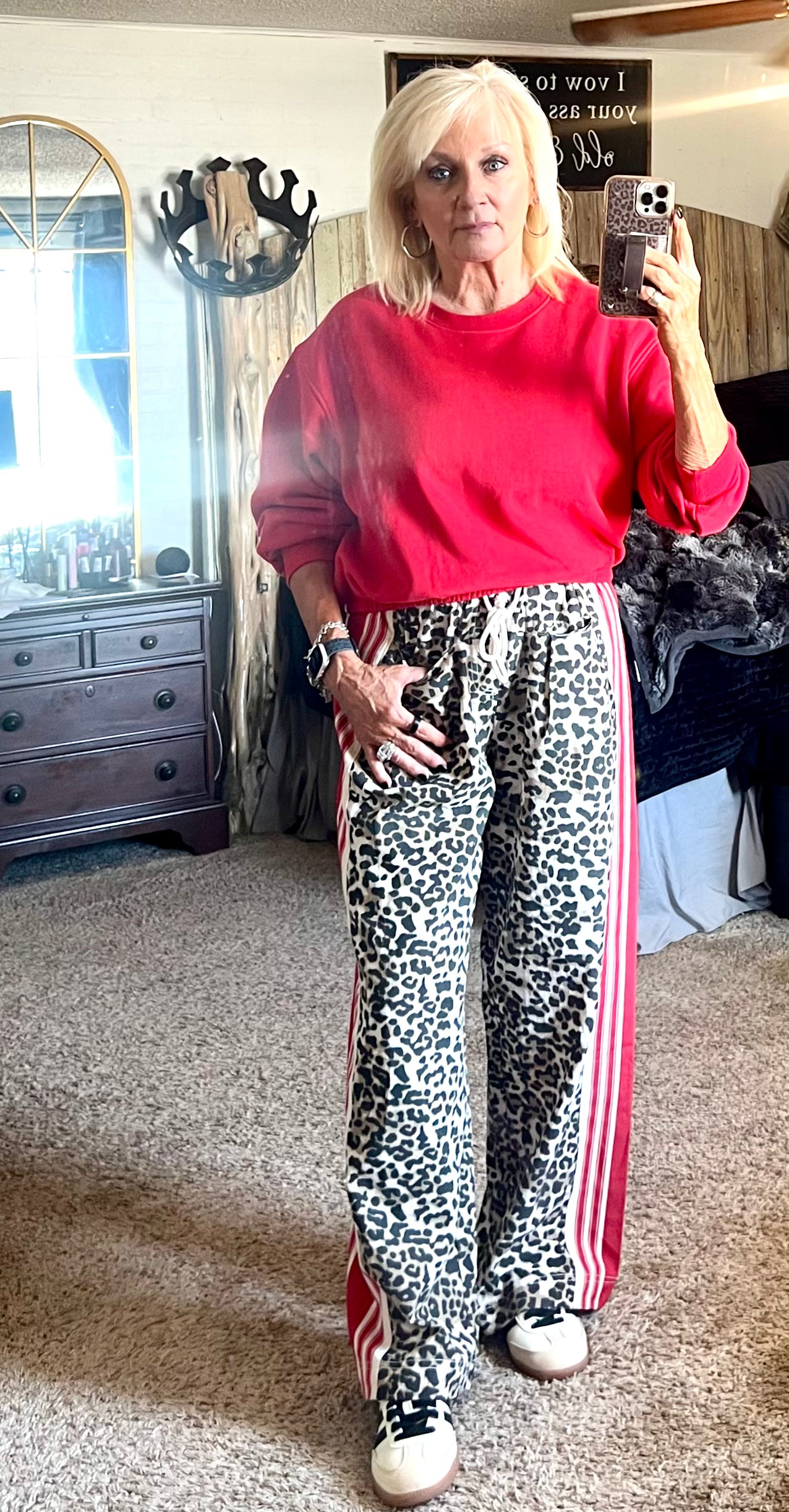 Leopard track pants with red stripes