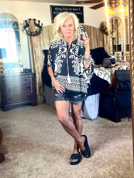 Black tunic with dolman sleeves